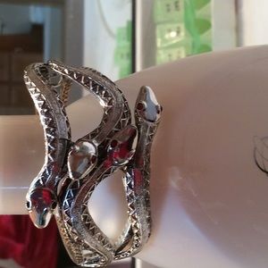Silver tone bypass snake bracelet